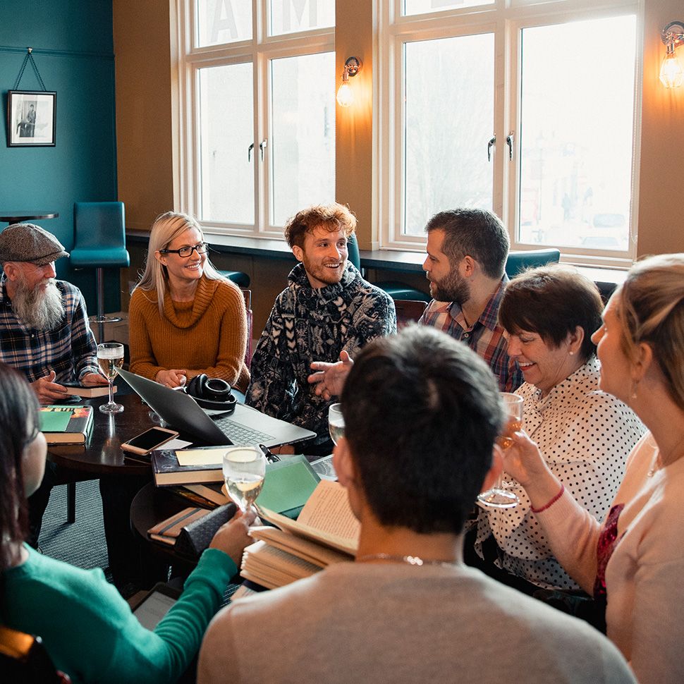 A group of residents holding a meeting to discuss their property management company